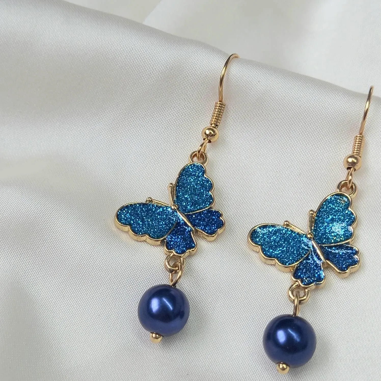 Blue Butterfly Drop Earrings - Lightweight Earrings,Blue Butterfly Earrings,Blue Earrings In The UK,Gold Butterfly Jewellery In The UK
