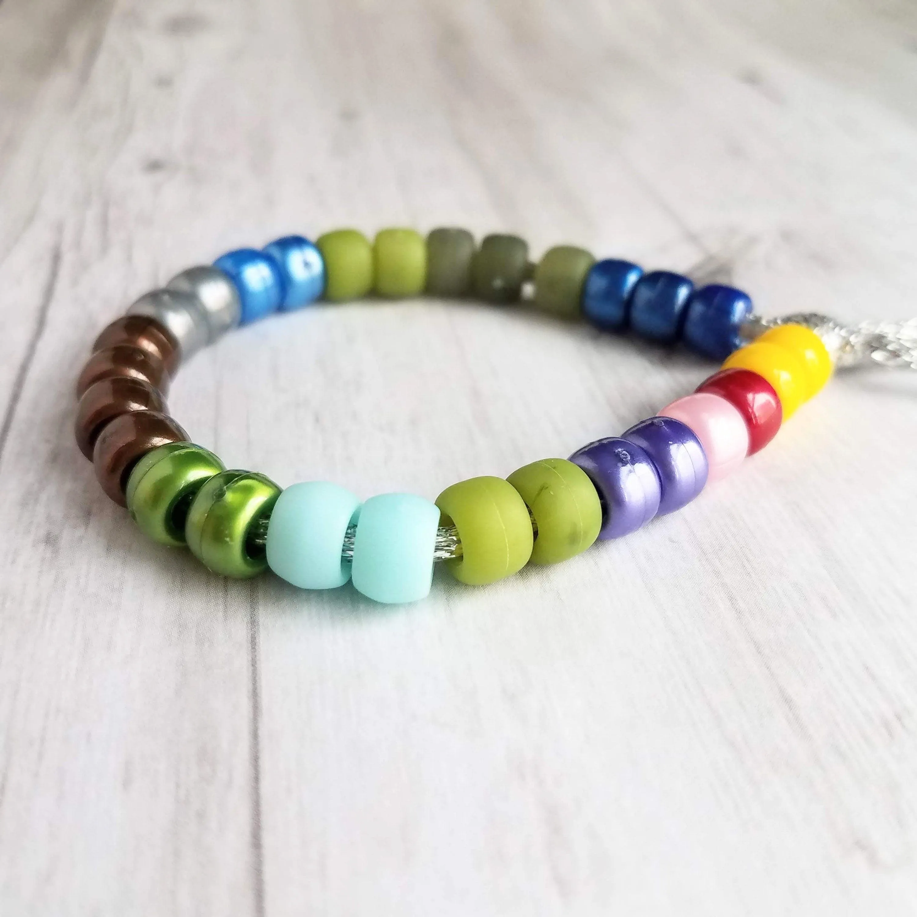 Crow Bead Bracelet, designer style bracelet, large bead tie on cord, big bead bracelet, ugly color bracelet, pony roller beads, chunky beads