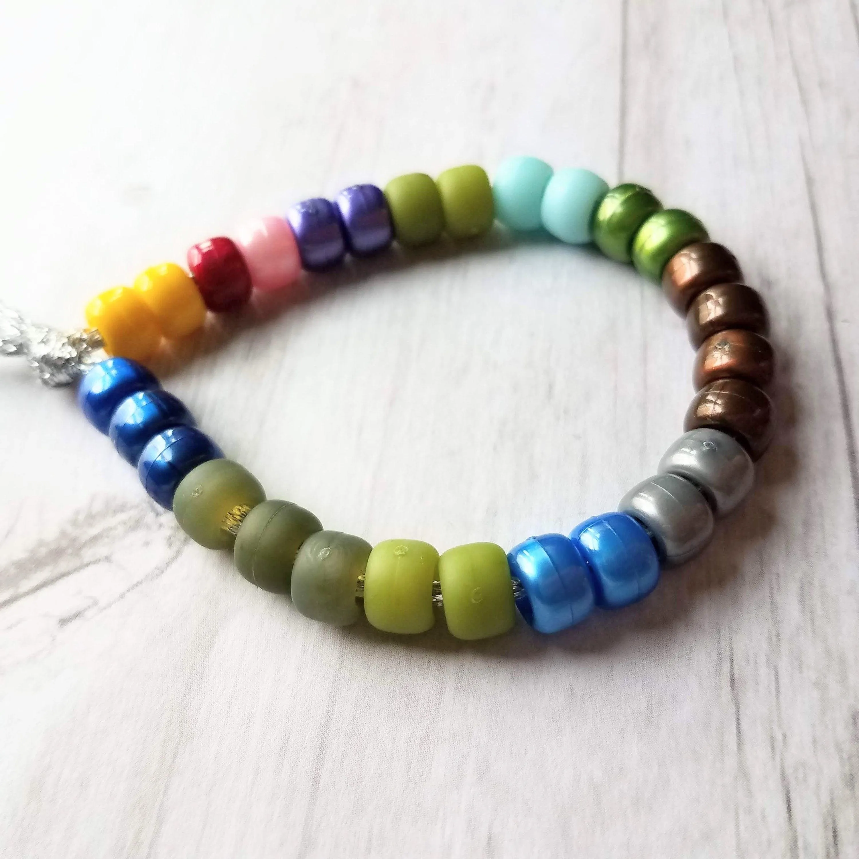 Crow Bead Bracelet, designer style bracelet, large bead tie on cord, big bead bracelet, ugly color bracelet, pony roller beads, chunky beads