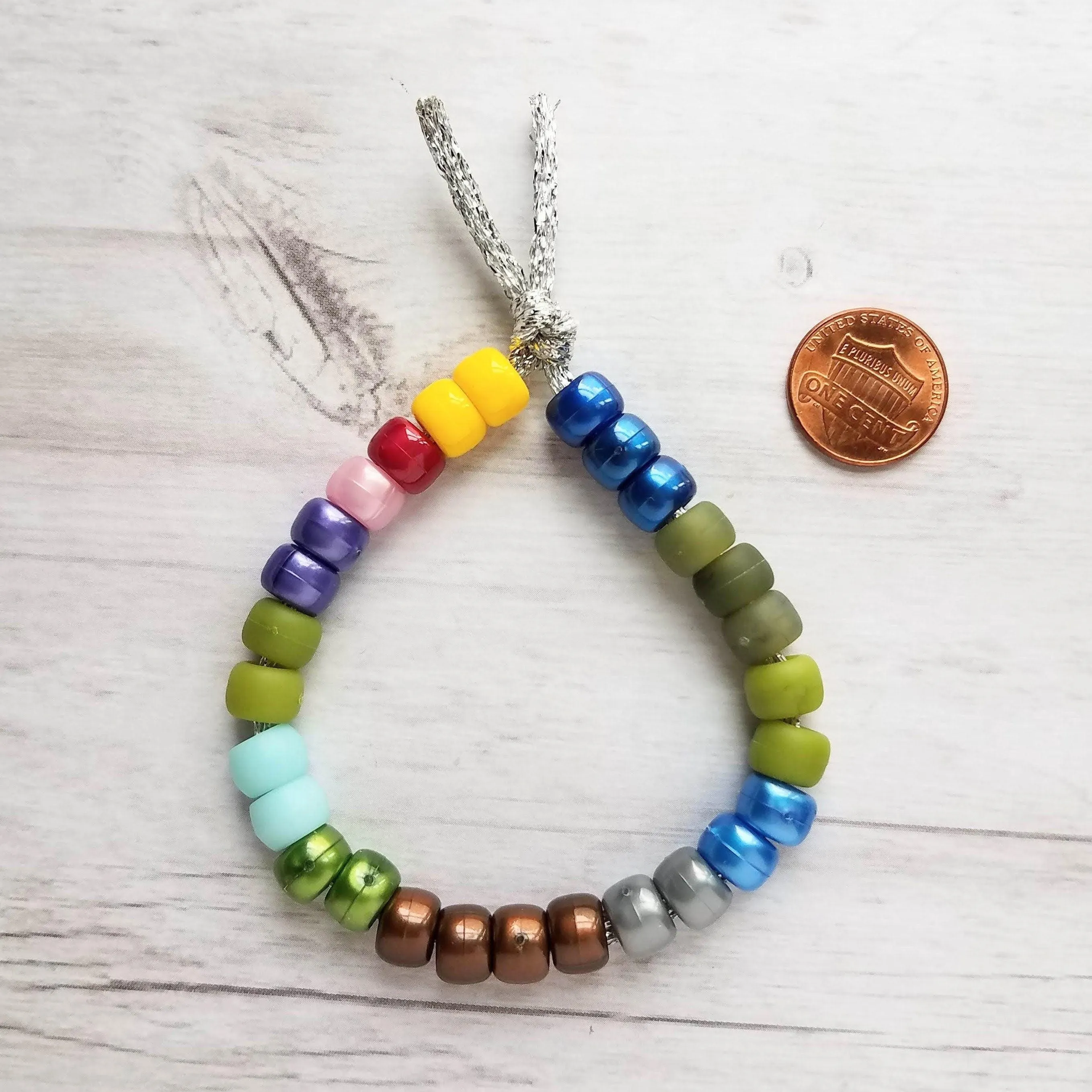 Crow Bead Bracelet, designer style bracelet, large bead tie on cord, big bead bracelet, ugly color bracelet, pony roller beads, chunky beads