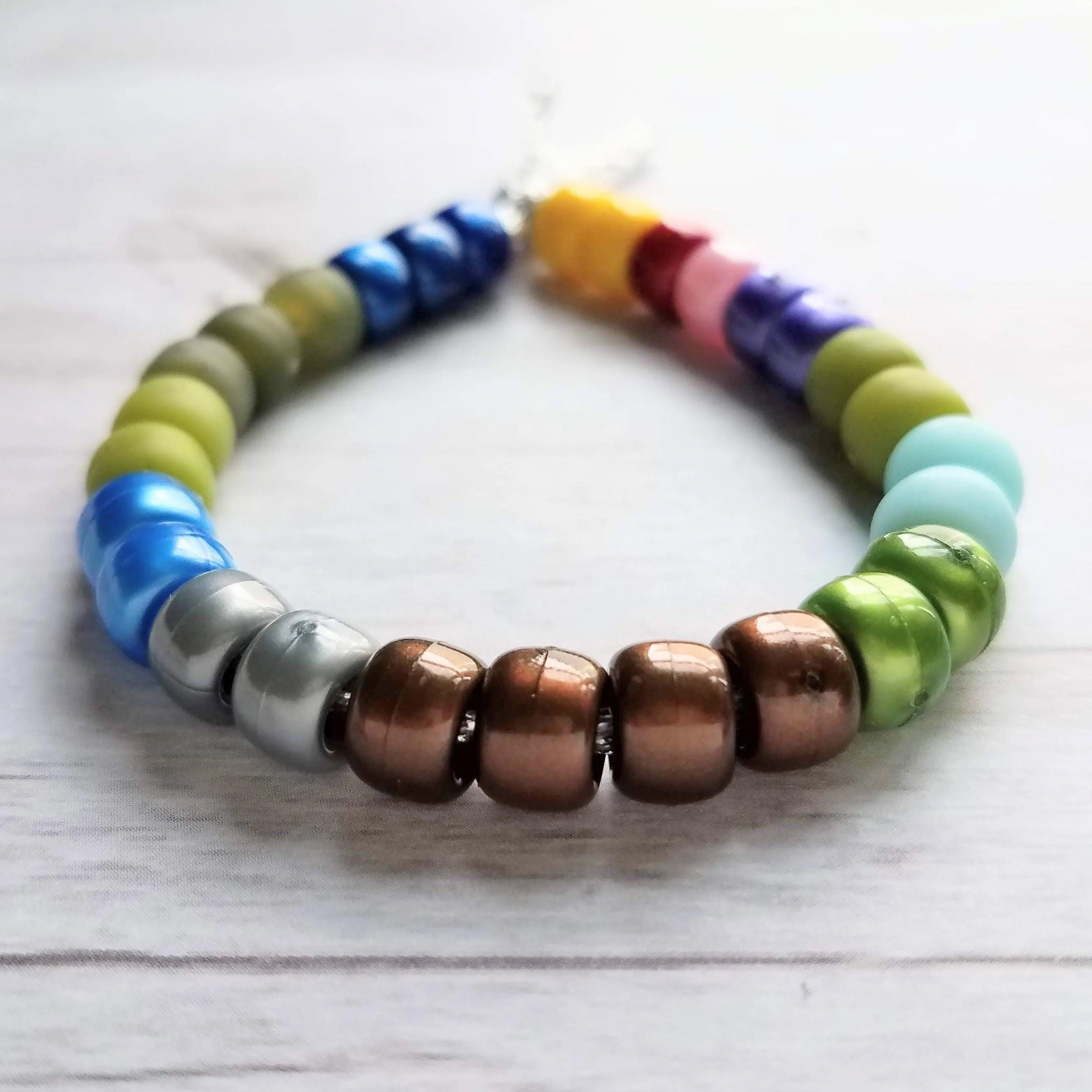 Crow Bead Bracelet, designer style bracelet, large bead tie on cord, big bead bracelet, ugly color bracelet, pony roller beads, chunky beads