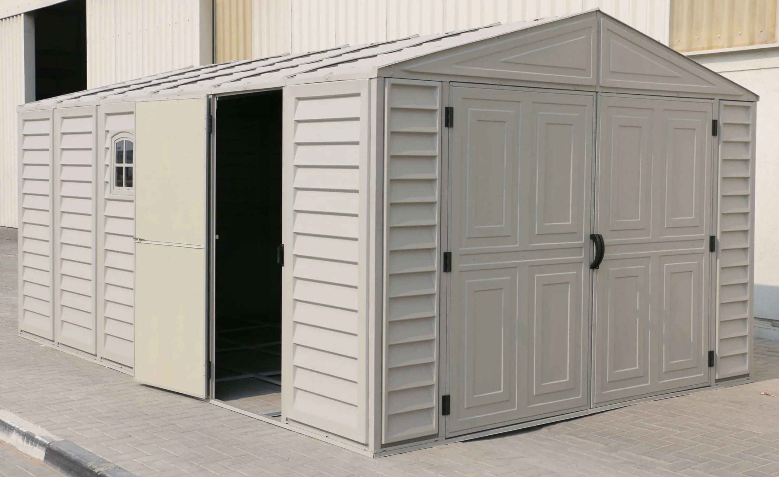 Duramax Vinyl Garage 10.5x15.5 w/ Foundation 2 Windows 15026