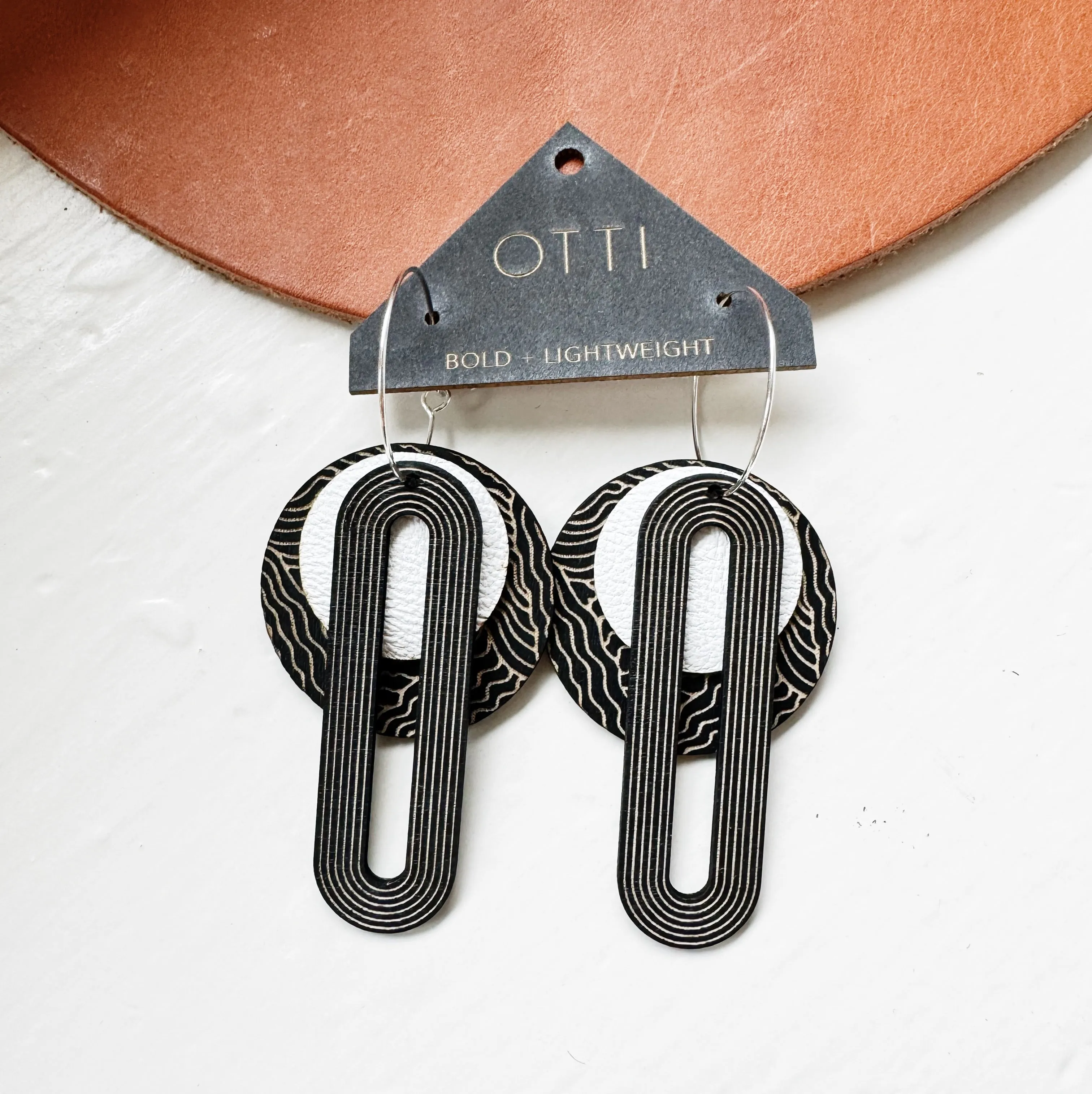 Lightweight leather   birch earrings: Linework design