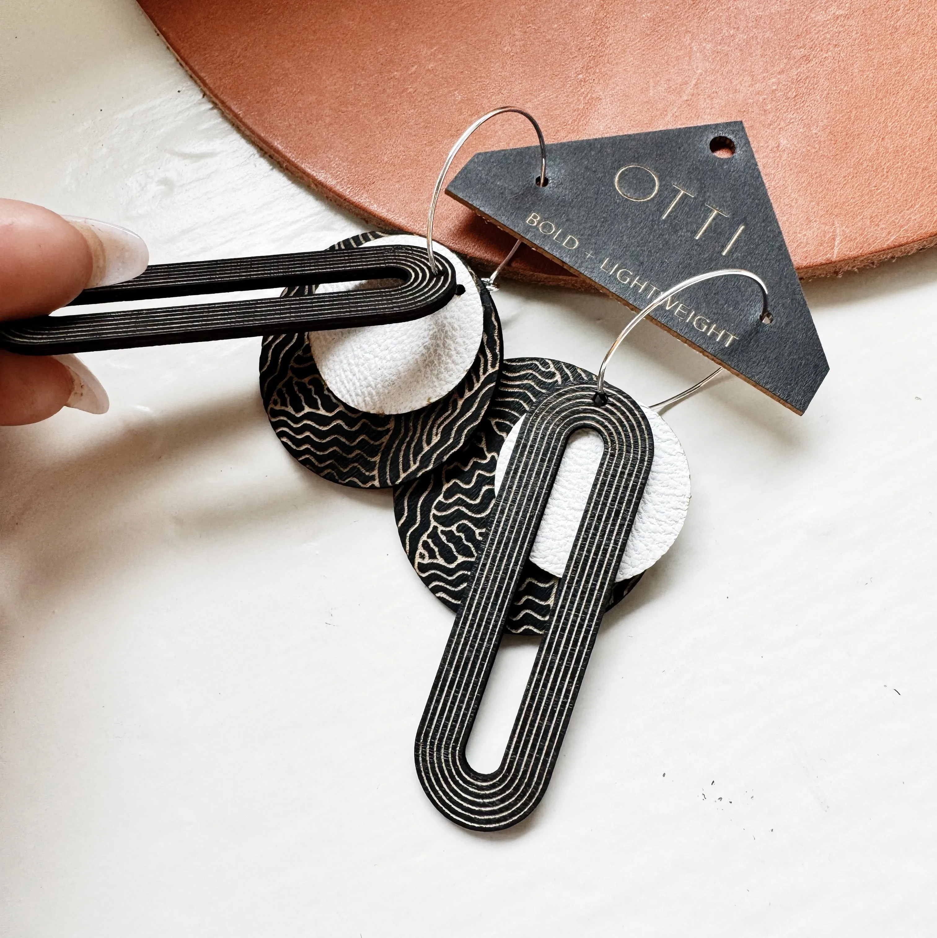 Lightweight leather   birch earrings: Linework design
