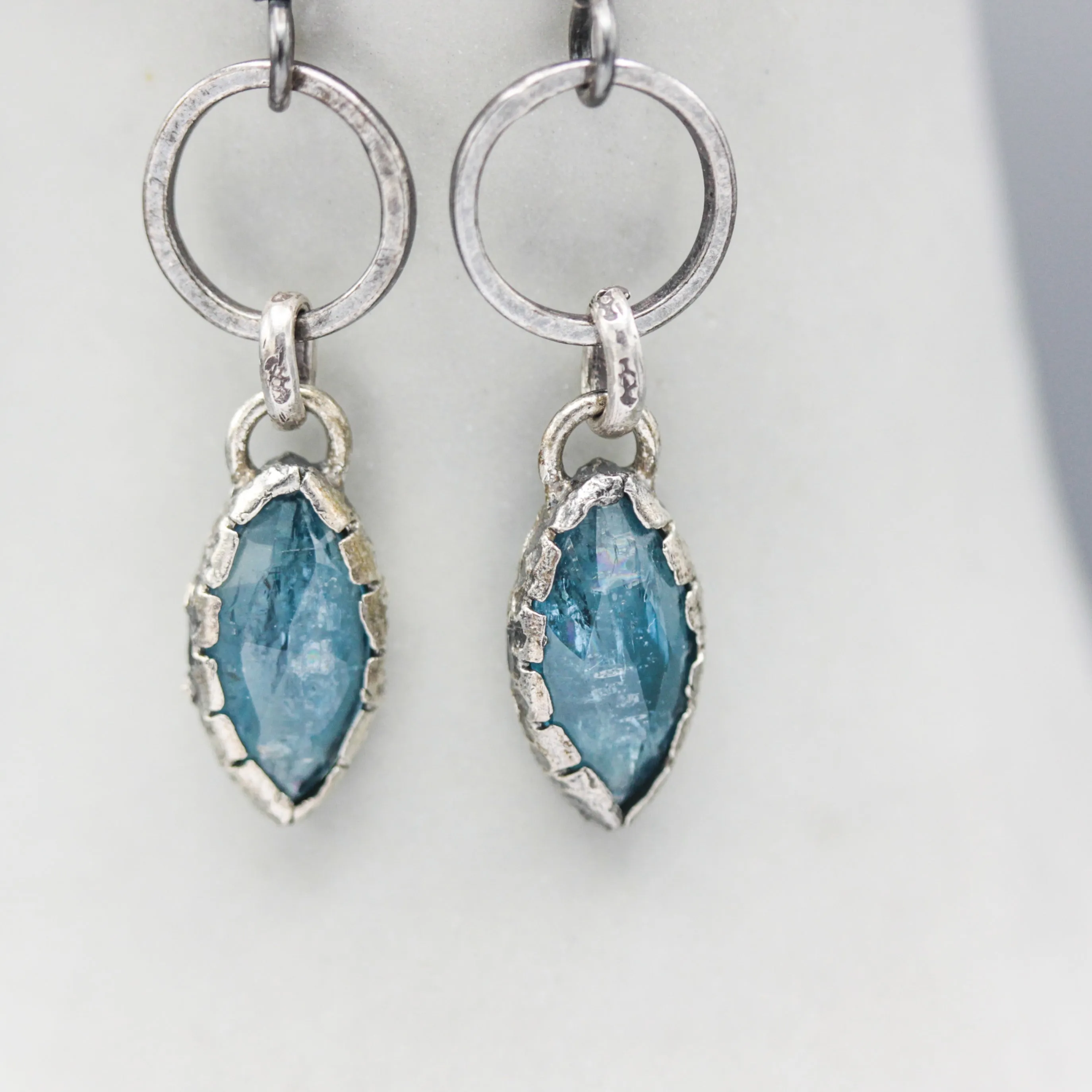 Marquise Blue kyanite earrings in silver bezel setting with silver circle loop on hooks style