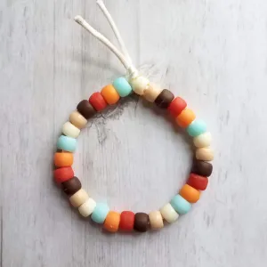Orange Blue Brown Bracelet, 70s colors, large pony bead bracelet, tie on bracelet, cord bracelet, big faux glass beads, chunky bead bracelet