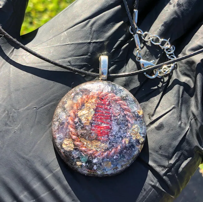 The “Tensor Ring Sun Disc” Orgone Amulet - Aura Protection