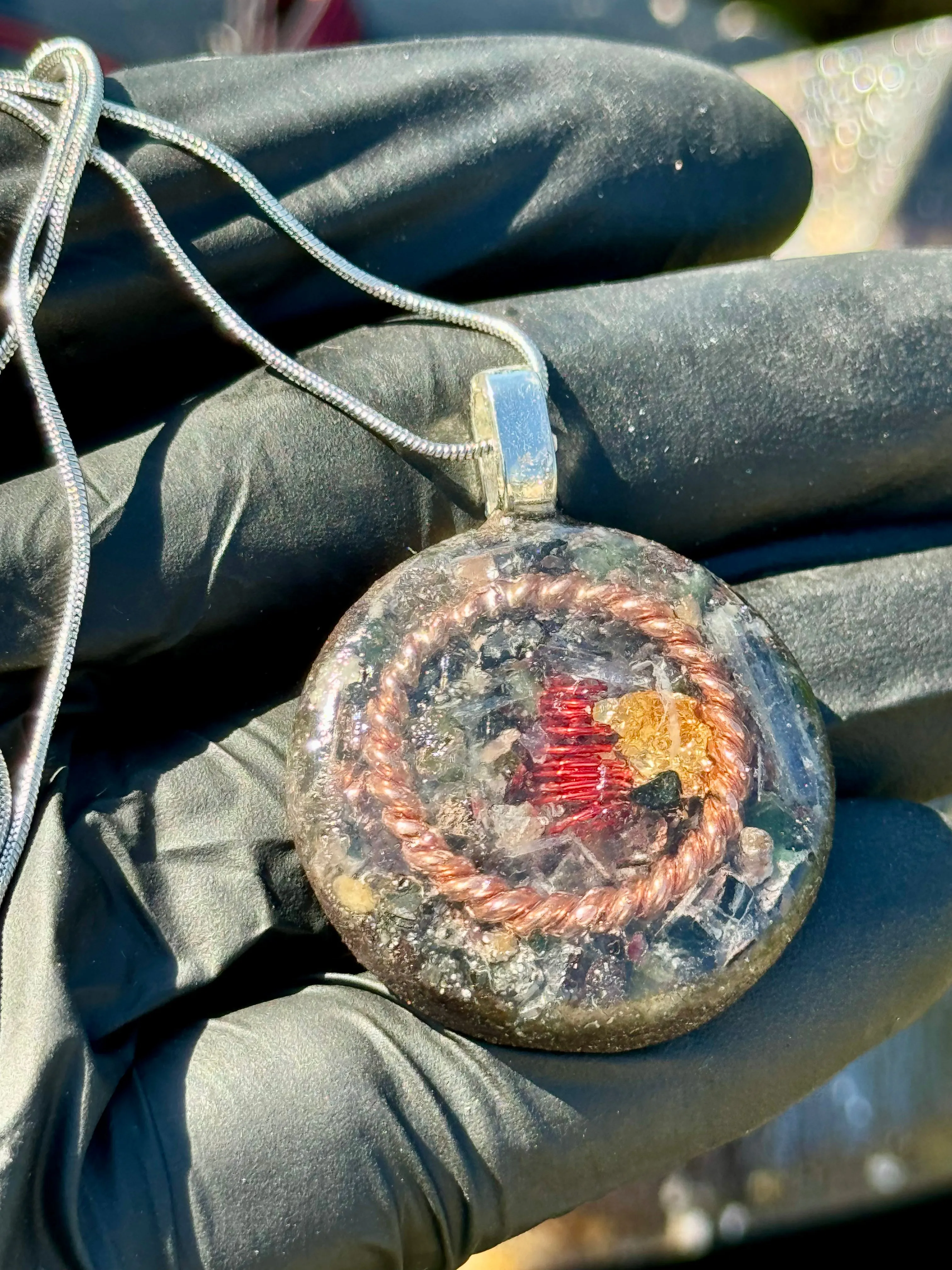 The “Tensor Ring Sun Disc” Orgone Amulet - Aura Protection