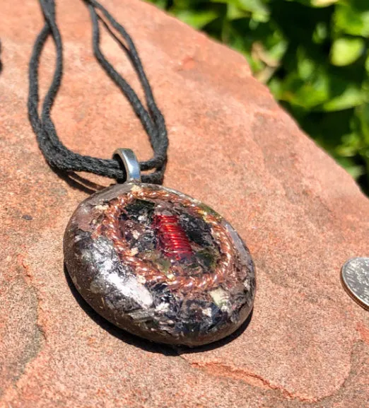 The “Tensor Ring Sun Disc” Orgone Amulet - Aura Protection