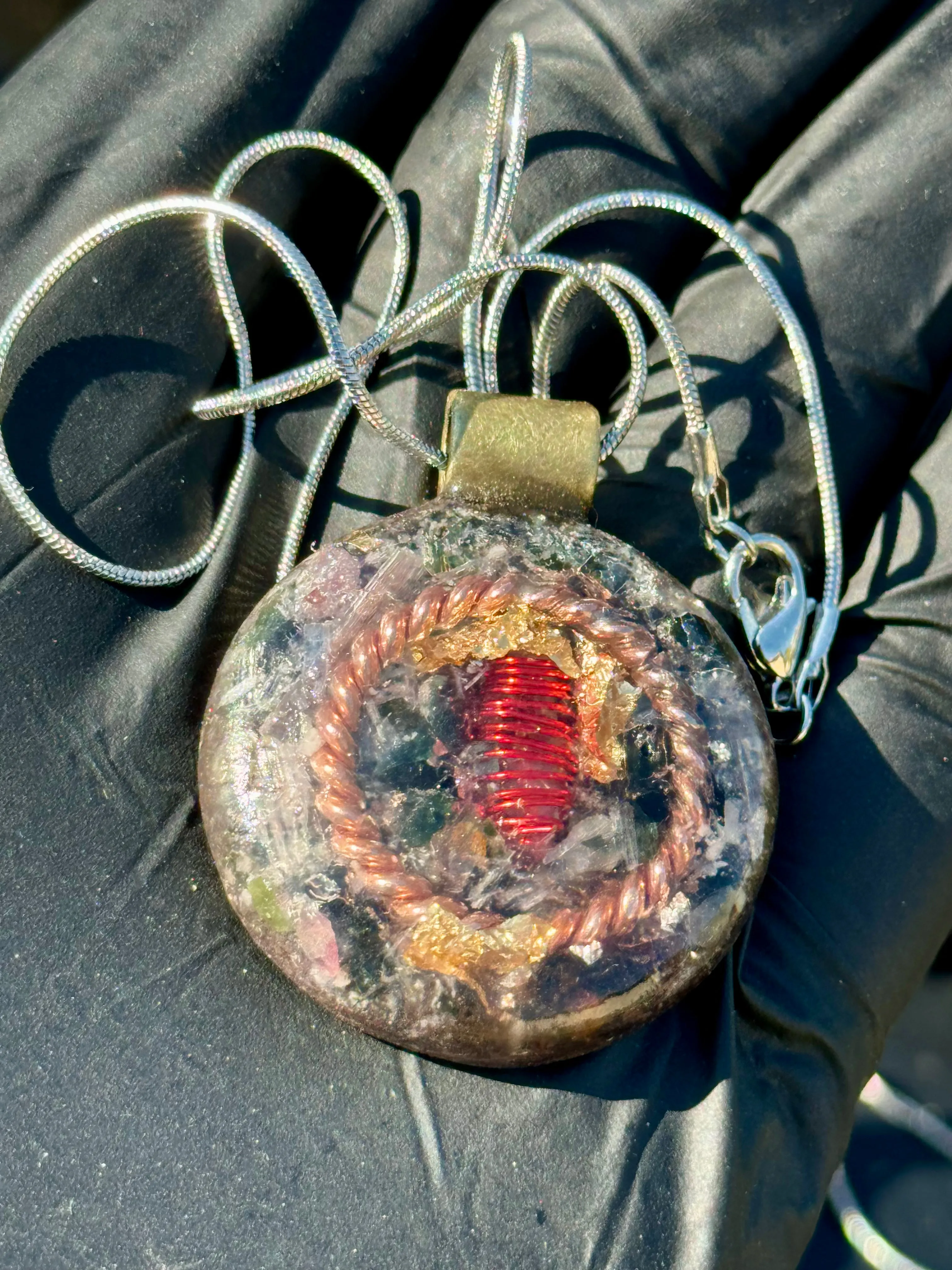 The “Tensor Ring Sun Disc” Orgone Amulet - Aura Protection