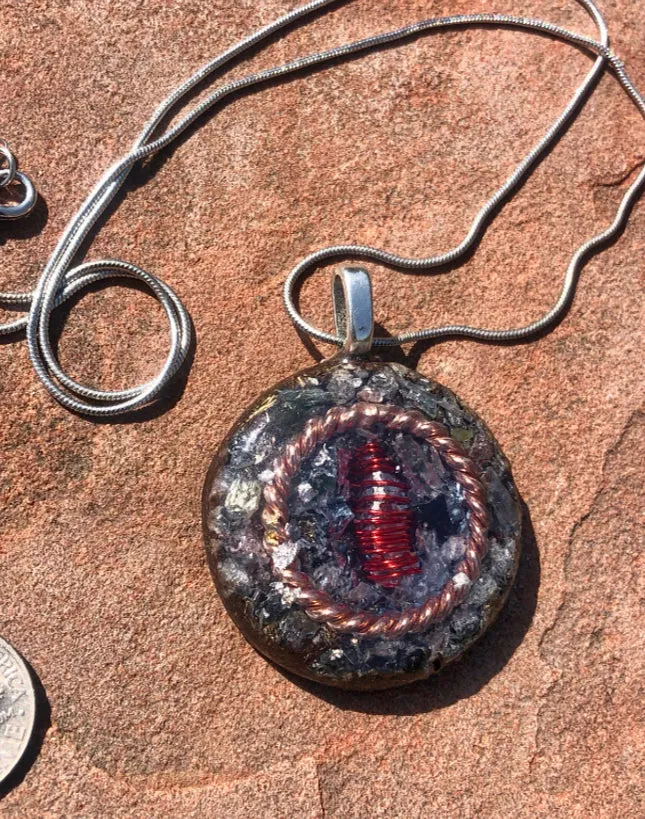 The “Tensor Ring Sun Disc” Orgone Amulet - Aura Protection
